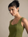 olive-green-stretchable-ribbed-peplum-top-side-fabric-zoom-in-uptownie.png