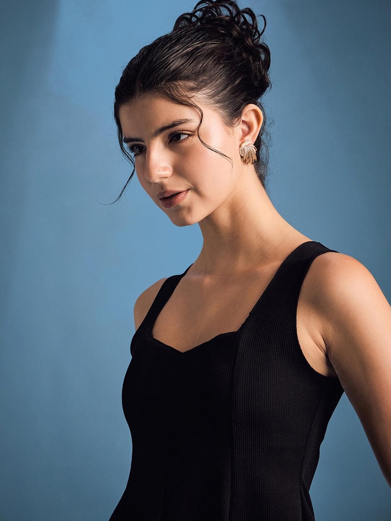 black-stretchable-ribbed-peplum-top-fabric-zoom-in-uptownie.jpg