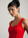 red-stretchable-ribbed-peplum-top-side-fabric-zoom-in-uptownie.png
