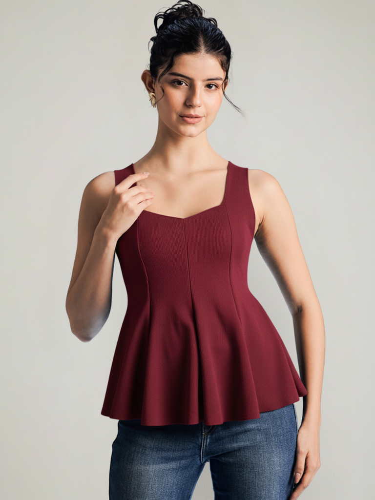 maroon-stretchable-ribbed-peplum-top-angled-front-view-uptownie.png