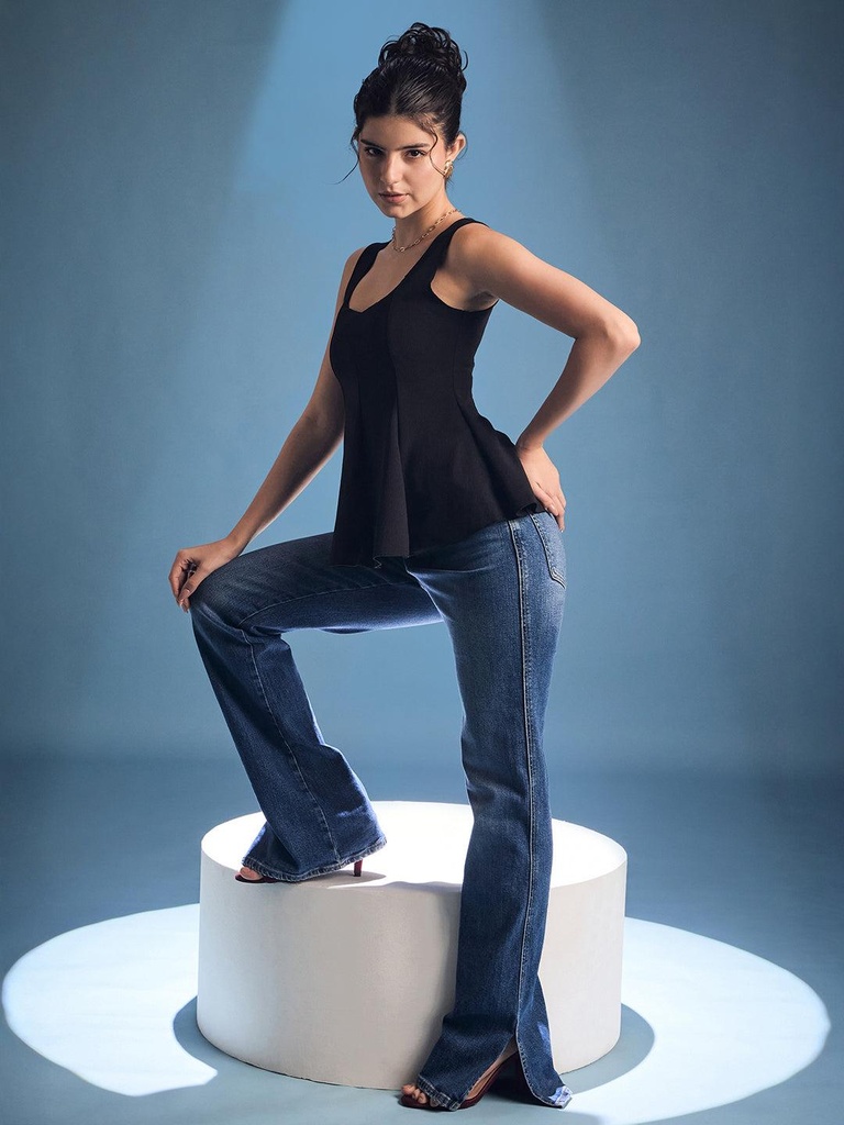 black-stretchable-ribbed-peplum-top-side-fabric-zoom-out-pose_2-uptownie.jpg